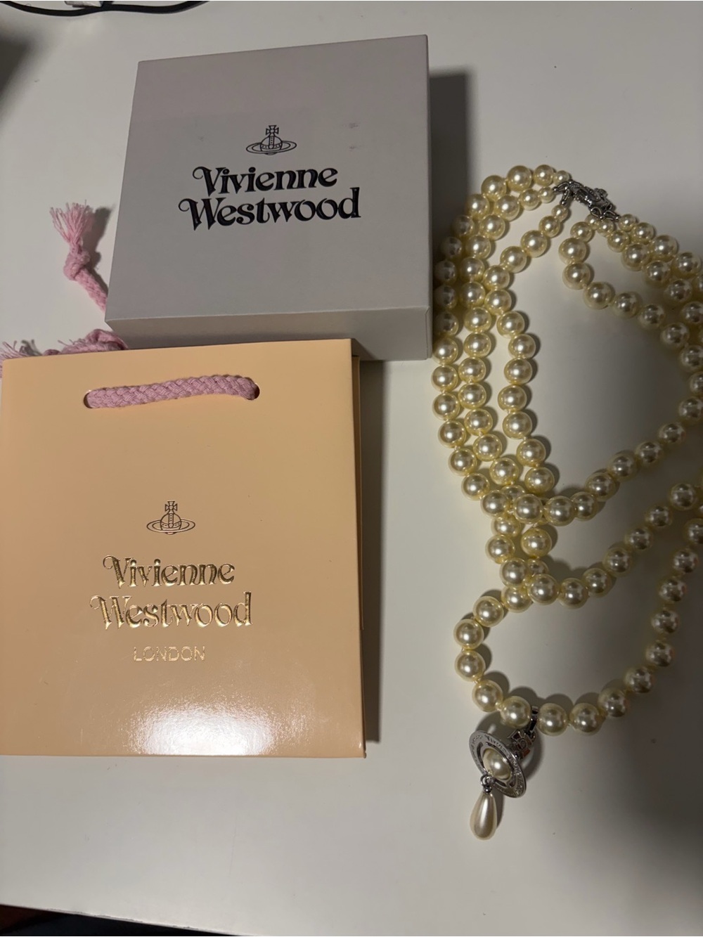Vivienne Westwood Three row bas relief pearl necklace in silver